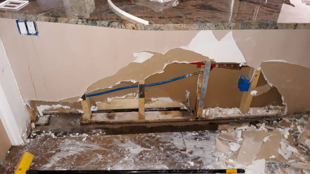 Best Flooded house restoration  in Somersworth, NH
